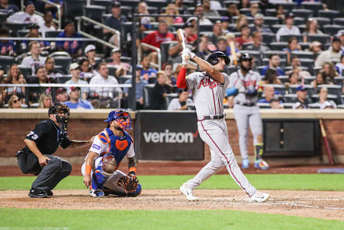 Aug 13, 2023; New York City, New York, USA; Atlanta Braves first baseman Matt Olson (28) hits a two run home run in the eighth inning against the New York Mets at Citi Field.